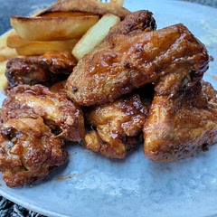 BBQ sauce, mixed with apple cider vinegar. Added chilli powder to coating