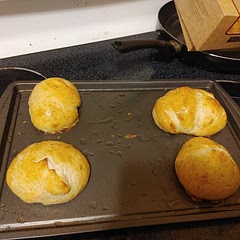 The Buns were pretty good nice and fluffy. However I did notice they had a slight Taste of egg to them which I believe is to be expected when there is an egg wash involved.

They also had a little bit of crunch to them