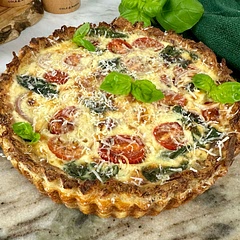Forget pastry – our base is all about the potato magic! 🌿 Sprinkle Parmesan, garnish with basil – culinary perfection!