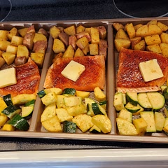 I swapped zucchini for asparagus. I have this cool 3 slot pan which put each portion into its own space. Next time, I'll plan to use less oil as salmon with butter provides enough, and I needed to cook the potatoes a few extra minutes.