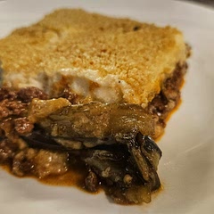 This is such a good recipe that is well worth the effort. I have tried it with lamb and with beef, and I think the lamb adds so much more to the flavor profile. I think next time I'll broil it for the last few minutes to get a darker crust on top.