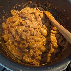 Didn't look pretty but tasted fine. The pickles added some nice crunch. I always think things need more cheese....

Update: I've since been making this with a mix of chicken and beef stock, and using extra sharp cheddar. I find it makes it even better