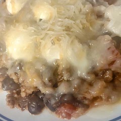 Added 14.5 ounce can of Diced Tomatoes, drained, several shakes of Louisiana Hot Sauce. Garnished with Sour Cream & Shredded Four Cheese Mexican Blend.