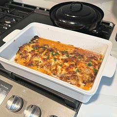 Easily a new go-to. Paired it with a Caesar salad and bread. 

Might try tossing the chicken in a frying pan for 2-3 minutes per side before baking to give it more of a crunch. But even as is, it was wonderful. Great recipe!