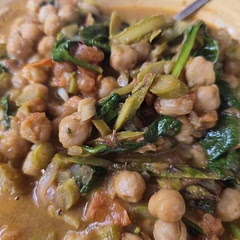 I used some veggies I had, spinach, tomatoes, and asparagus. I didn't use Cajun spices just garam masalam, garlic salt, and regular salt.

I generally dislike coconut milk but the taste mellows out in this recipe.

Pretty good! 