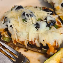 Delicious! When I scored the mushroom instead of just olive oil and S&P, I also added garlic powder and Italian seasoning. For toppings I did sauce, browned diced ham, green pepper, black olives, green onion, and mozzarella & Parmesan. 