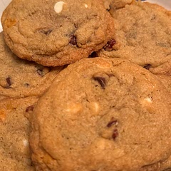 Add butterscotch chips, chocolate chips, pecans, and white chocolate (1cup total)