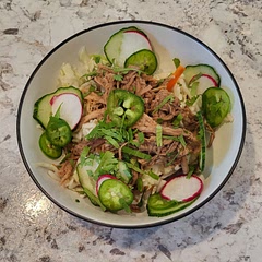 So good! I added red pepper flakes and sriracha to the sauce. As well as some onion powder on the pork. Shredded and just added back in with the juice. Used Mokfruit sweetener instead of sugar. Also just used pre-bagged coleslaw mix (cabbage and carrots) and dressed in the vinager mix. Topped with a drizzle of gochujang. So good!