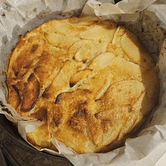 I really liked the taste of this recipe! Some things I did differently.

Make sure all ingredients are room temp.
Melted the butter then added sugar to melt the sugar also. Mix lukewarm milk with eggs as written. Do everything else as written.

1/2 cup sugar
1 cup plain flour and 2 tsp baking powder

If apples go above cake mix, I melted more butter to spread on top to cover exposed apples.

Bake for 30-35 mins fan forced 

