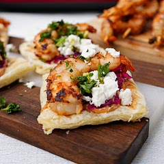 Notes:

* Ensure the grill is properly preheated to get a nice char on the prawns and puff pastry.
* Feel free to customise the toppings with your favourite ingredients, such as pickled onions, jalapeños, or a squeeze of extra lime juice.

