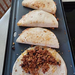 This was a great recipe. Very hearty.  My guys loved it (I was liberal  with the mexican-blend cheese).  For next time I will add cilantro before folding