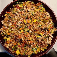 I added broccoli, which was cooked in the microwave in a bowl with a little water in the bottom for 4 minutes. I then added it in the pan when I would have added the carrots. Instead, I used both frozen peas and carrots. I also cooked chicken in the oven and then pulled it apart and added to the finished rice and vegetables.