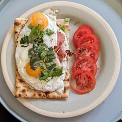 Super satisfying and tasty! The pesto yogurt is a great idea. The OG recipe didn't have bacon, but I really enjoyed it with the added crispy saltiness. I'll make this again. 