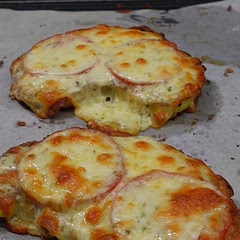 For a little extra flavor add some marinara sauce before putting the tomatoes on and then the cheese.