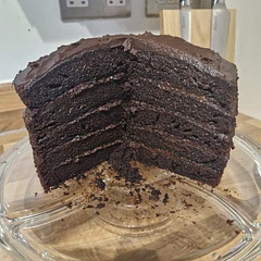 Really lovely recipe. I did panic when the mixture was very liquidy, and I had to ladle it into the pans but baked perfectly. I had left over mixture, so did 5 layers. 
Halved the buttercream filling recipe and ended up being the perfect amount. 
