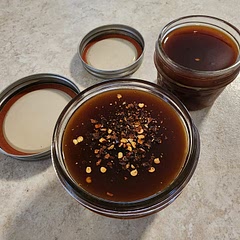 I'll never buy store sauce again! I split and added crushed red pepper to make half a little spicy. Kept it natural and skipped the food dye.
