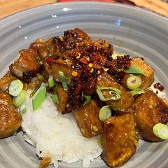 Topped with some chilli oil and tossed with some black/white sesame seeds