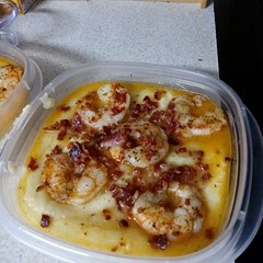 Haven't eaten yet...this is for the freezer. Made as printed, with garnish to be added at mealtime. The odd leftover shrimp were delicious! Used quick grits and cooked according to pkg instructions.