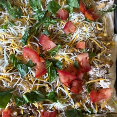 I mixed the taco seasoning into the cream cheese/sour cream (flavorful!) and the mixed taco cheese into the ground hamburger. I also did a sprinkle of Mexican blend cheese on top. This is really good. Would happily make it again!