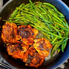 This was pretty good. I doubled the amount of all chicken seasonings, as previous reviews mentioned a bit bland. I cooked the beans for 5.5 mins because 8 mins sounded too long in the microwave. I halved the Sriracha and glad I did because the beans had just enough heat. I also covered them for a while in the pan before adding the chicken back in because they were still a bit too crisp, so maybe 6 - 6.5 mins in the microwave next time. Our 13 yr old daughter actually ate this so I'll make again. 