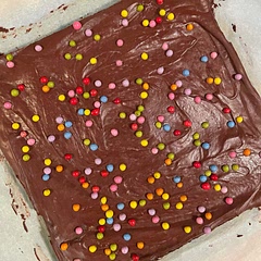 So good and decadent. I used to regularly purchase the Little Debbie Cosmic Brownies when I was in college and as soon as one saw this recipe it made me nostalgic. The rainbow candy coated chocolate chips really take this recipe to the next level.