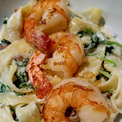 Hmm? Next time, I would use Italian sausage because it was too heavy for shrimp. Also, substitute spinach for the arugula. Season with salt for sure. Haha, guess I just changed this whole recipe. Best thing? The roasted pine nuts!