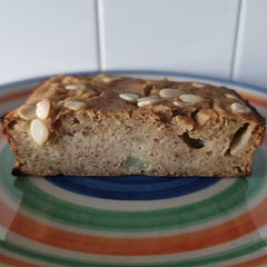 Adjusted with around 80g green apple sauce, 10g lesser yoghurt, mixed flavoured quick oats with quinoa flakes grinded, and 1 tbsp monk fruit.
Baked half recipe portion at around 35m, increased top temperature to around 200c for the last 5m but top still not browned.
Result - sweetness level just right. A bit dense and soft. 
Next time - reduce liquid or increase bake time. Place at upper rack with lower pan or increase top temperature.
