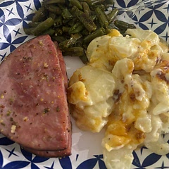 I used the recipe for the ham only, made my own potatoes and green beans. But the ham glaze was so good. I have a picky eater that doesn’t normally like mustard and he liked this meal.