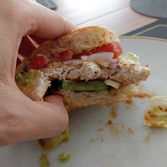 Half breast's smoked cheddar tomatoes and cucumber as well