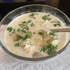 No bacon this time. Sautéed onion, fish and veggies first in oil and butter. Then added a bit of flour and half and half cream plus a bit of milk. Served with fresh parsley.