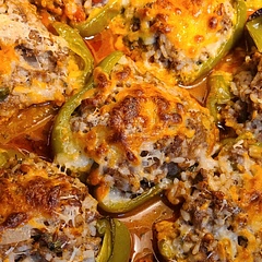 These were insanely good! I used short grain rice instead of long and it was fine. The other modification I made was to top with mozzarella and parm cheese.