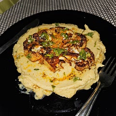 Surprised how amazing this tasted.
Although lack of prior experience cooking a slab a cauliflower was a challenge.