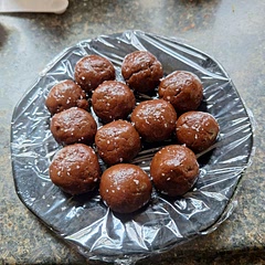 No matter how many you're making, double the coco, double the maple syrup. If too sticky, drizzle oil until it can be squished without sticky to your fingers or spoon