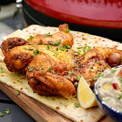Notes:

	•	Marinating: For deeper flavor, marinate the chicken overnight.
	•	Grill Temperature: Ensure the grill is preheated to avoid sticking and achieve even cooking.
	•	Butter Basting: Baste the chicken with butter mixture several times for a crispy, flavorful skin.
	•	Baba Ganoush Texture: Adjust tahini and lemon juice to achieve your desired consistency and flavor.
