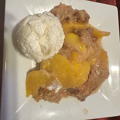 I used frozen peaches and I put the peaches in the oven with the butter instead of cooking on the stove I like my peaches a little more firm… I added some vanilla extract to the peaches and nutmeg, allspice, and ground cloves to the batter.