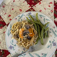 I added way more mushrooms than the recipe called for.  I added red pepper flakes, onion and sliced peppers.  The beans were my first pick from the garden.  I will be making this soon!