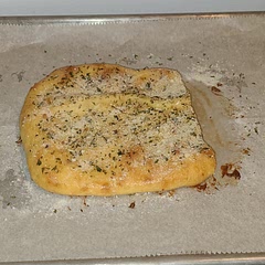 I made it a little thicker than the picture.  Made base dough and added butter, parmesan, oregano and parsley on top.  It was good.
