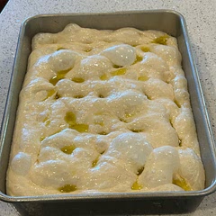 Pre-baking  pix to show all the great bubbles! 
Did add 1/3 cup of ripe sourdough starter for flavor. Just salt on top this go around. Baked up beautiful! Perfect recipe if you want same day deliciousness.
