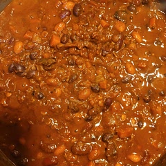 This was time-consuming, and I made a few tweaks, but it was ultimately delicious and worth the time and effort. I charred the eggplant in the oven because the way that is described in the recipe sounded insane and intimidating. I also added more beans (a can of black and pinto plus the kidney beans), less lentils (1/2 cup), and a whole can of Chipotle in Adobo. Only used 2 cups of stock. Added a dash of liquid smoke. Served with fritos and shredded cheese. Absolutely delicious. Will definitely make again.