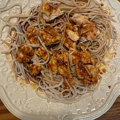 I served over rice noodles. The chicken seasoning was okay, the sauce is what made it. It was a very easy recipe. I also made edamame with it. My toddler devoured the noodles and sauce.