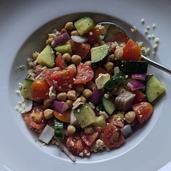 I added bulgur cooked in broth to this for a dinner dish. It was yummy and I have leftovers for lunch. The longer you let it marinate in the dressing - the better.  