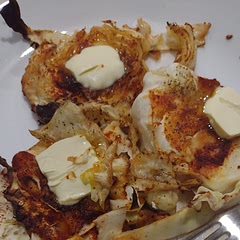 Put a thin slice of butter on each cabbage while it's hot. 