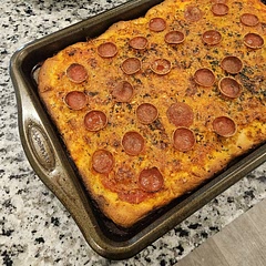 Great recipe for quick pizza dough. Better used in a cast-iron for pan pizza