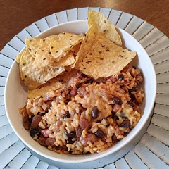 No corn, sauteed half an onion and some garlic in some oil before cooking meat. Added black beans to the recipe as well. Would also be good as a burrito.