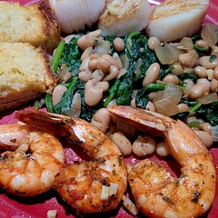 I'm not going to lie. I just made this recipe for the baked shrimp. Followed the shrimp seasoning and did put it in foil and baked. Excellent! Served with white beans and spinach and pan seared scallops. Baked the shrimp for 15 minutes. 