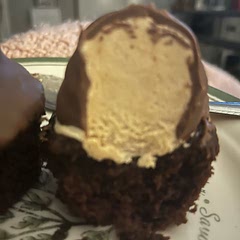 Mine aren’t nearly as pretty as Sally’s and I used milk chocolate instead of semi sweet - they taste good love the peanut butter icing!  I need to practice dipping the cupcakes but not bad for a first try!