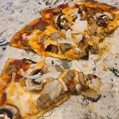 Pretty good. Added oregano & minced garlic to the dough. Forgot to parbake it but cooked it in a screaming hot cast iron skillet so that made a big difference. Checked on it at 10 minutes then cooked it for 4 more.