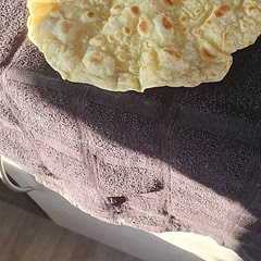 This dough was super easy to make.  They became bases for homemade pizzas yum! I  will definitely be making these again 