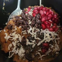 I topped it with chia, coconut, pomegranate & chocolate 