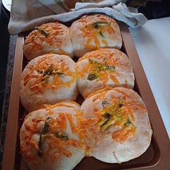 I made like burger buns and filled with pull pork yum I also made some like cinnamon rolls without the brown sugar or cinnamon  instead cheese and jalapeños into cinnamon roll style